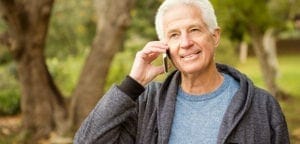 senior man on the phone