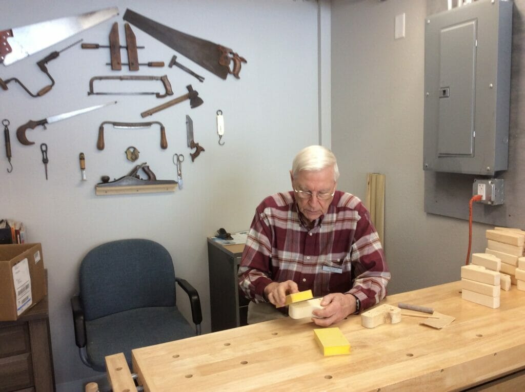 sanding a woodshop project