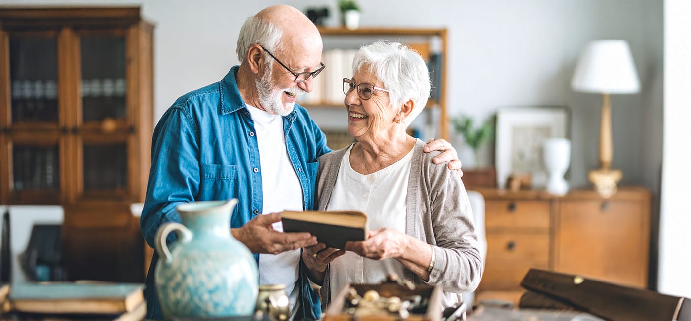 Senior couple going through belongings